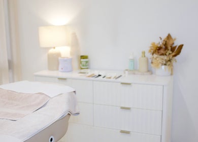 Elegant treatment room at Fleek Aesthetics, Mount Pleasant, Queensland, AU with modern decor and cozy lighting.