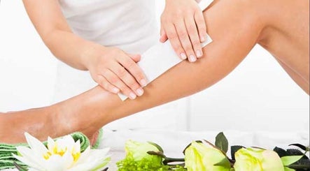Leg waxing treatment at Vivid Volume, Wakefield, England, GB. Achieve smooth skin with professional care.