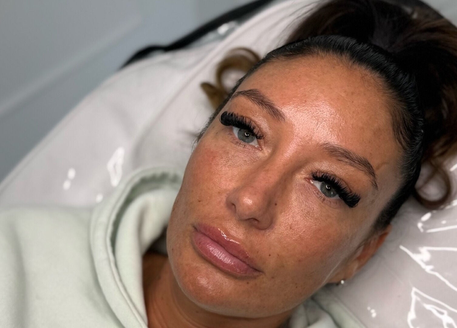 Client with radiant skin and long lashes at Perfect Profile Aesthetics, Middleton, England, GB.