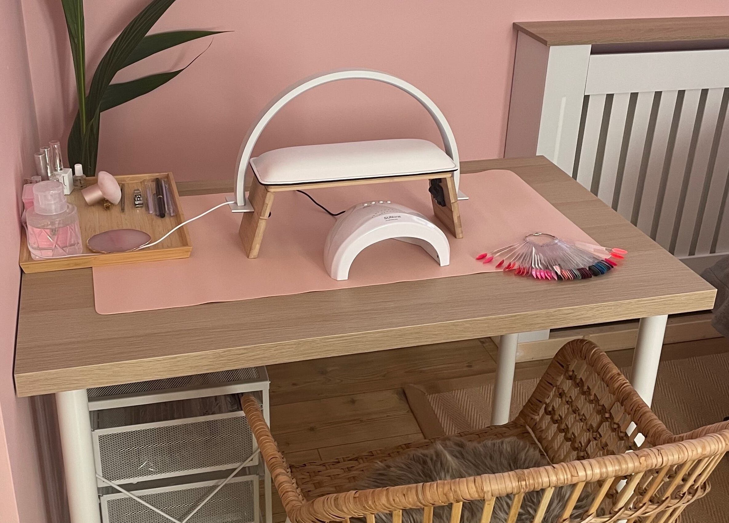 Nail station setup at Lyndsay’s Beauty, Bottesford, England, GB with manicure tools and pink decor.