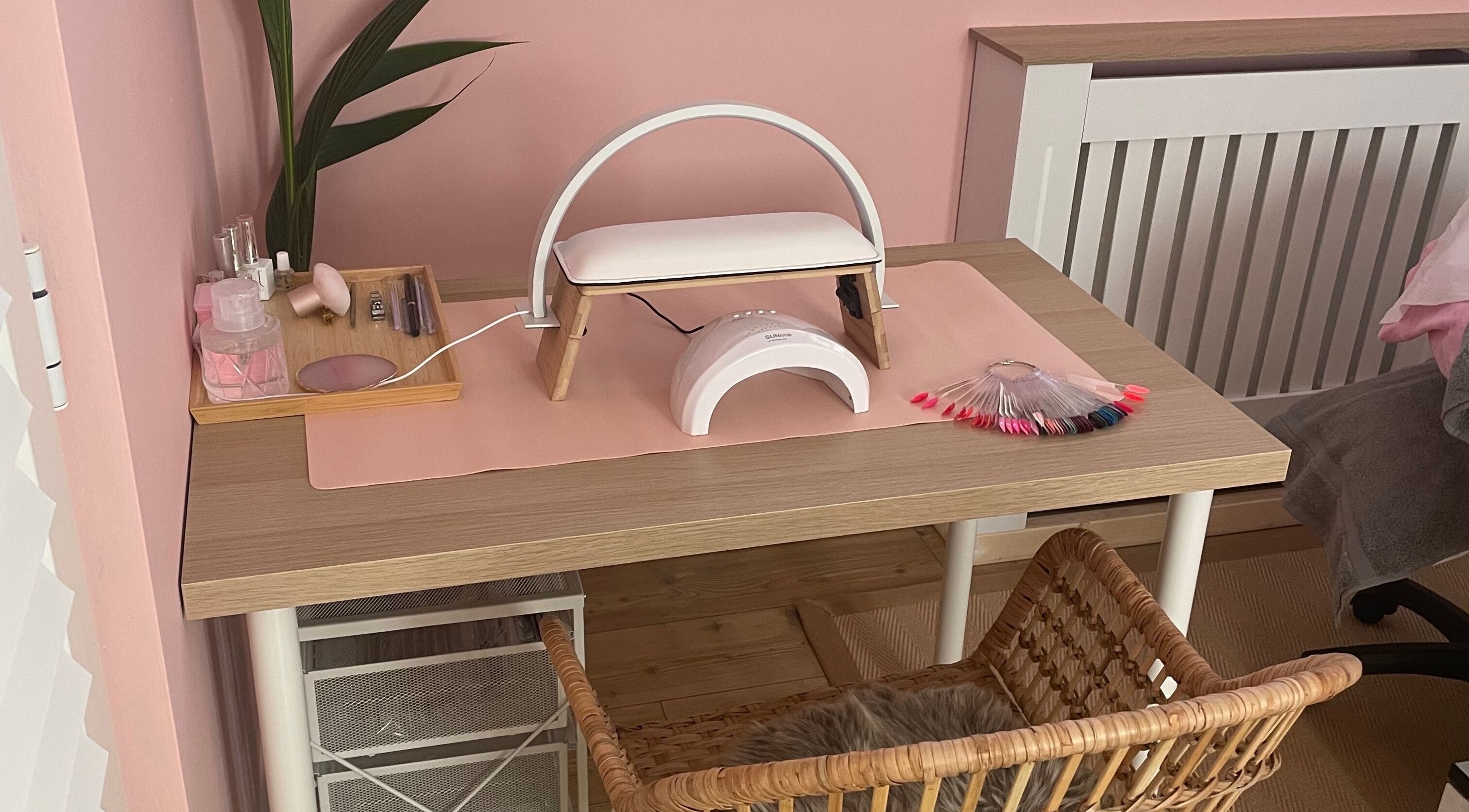 Nail station setup at Lyndsay’s Beauty, Bottesford, England, GB with manicure tools and pink decor.