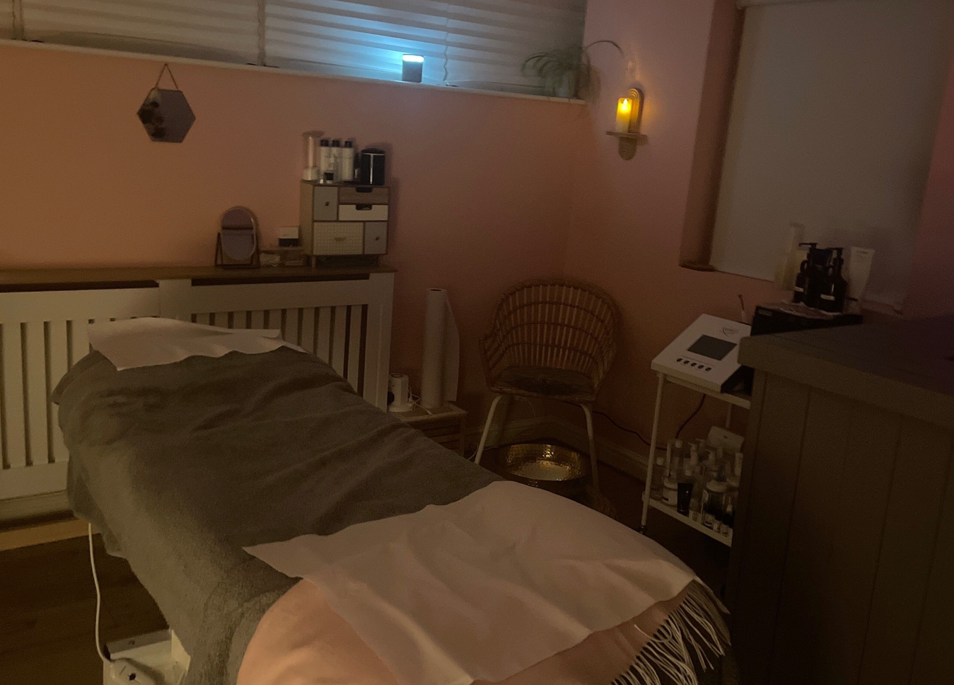 Relaxing spa room at Lyndsay’s Beauty in Bottesford, England, GB, featuring a treatment bed and ambient lighting.