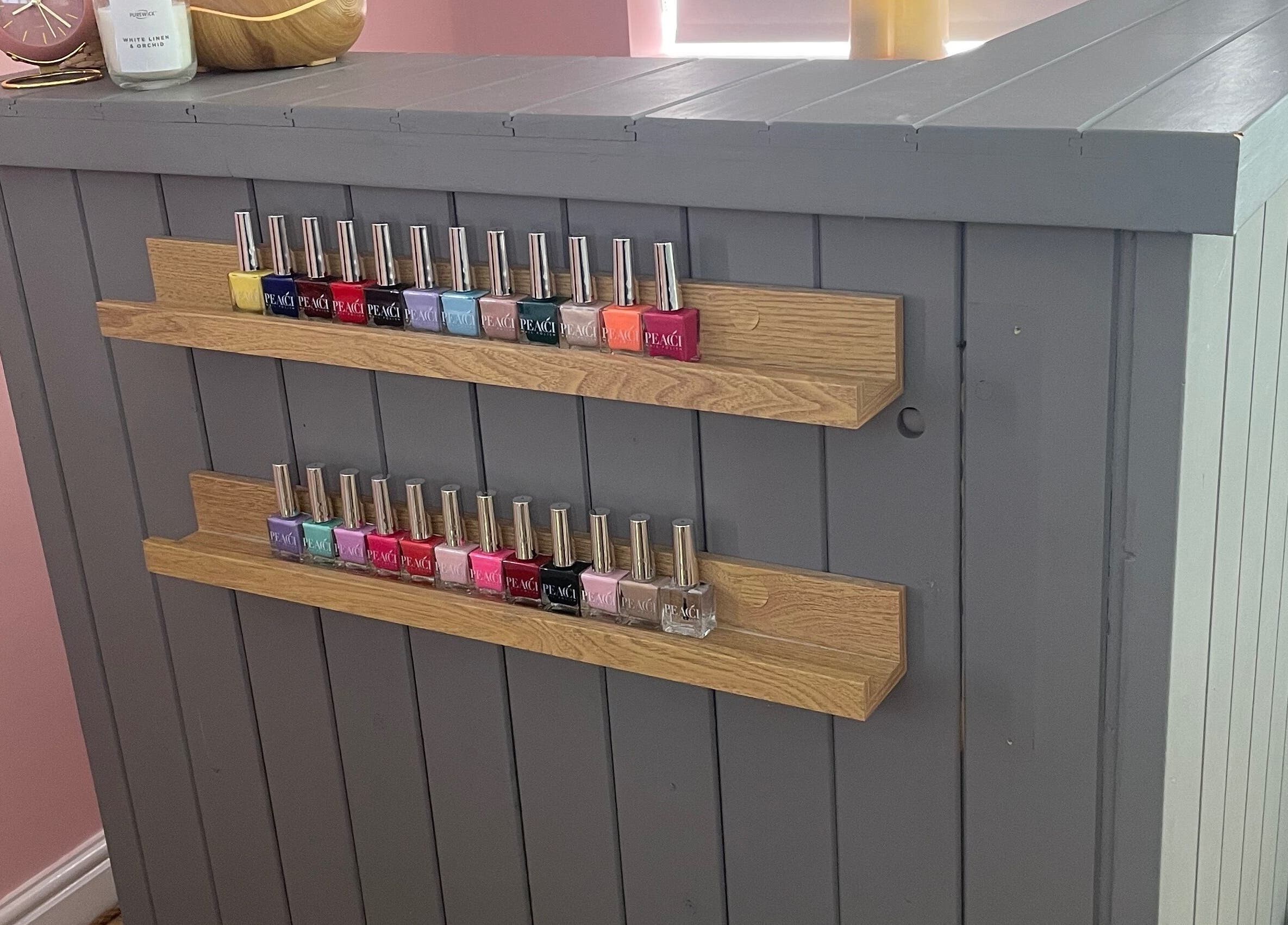 Vibrant nail polish display at Lyndsay’s Beauty, Bottesford, England, GB, enhancing the elegant salon atmosphere.