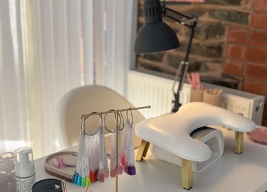 Cozy nail care station at Gels by Meg, Welshpool, Wales, GB, featuring tools and a relaxing setup.