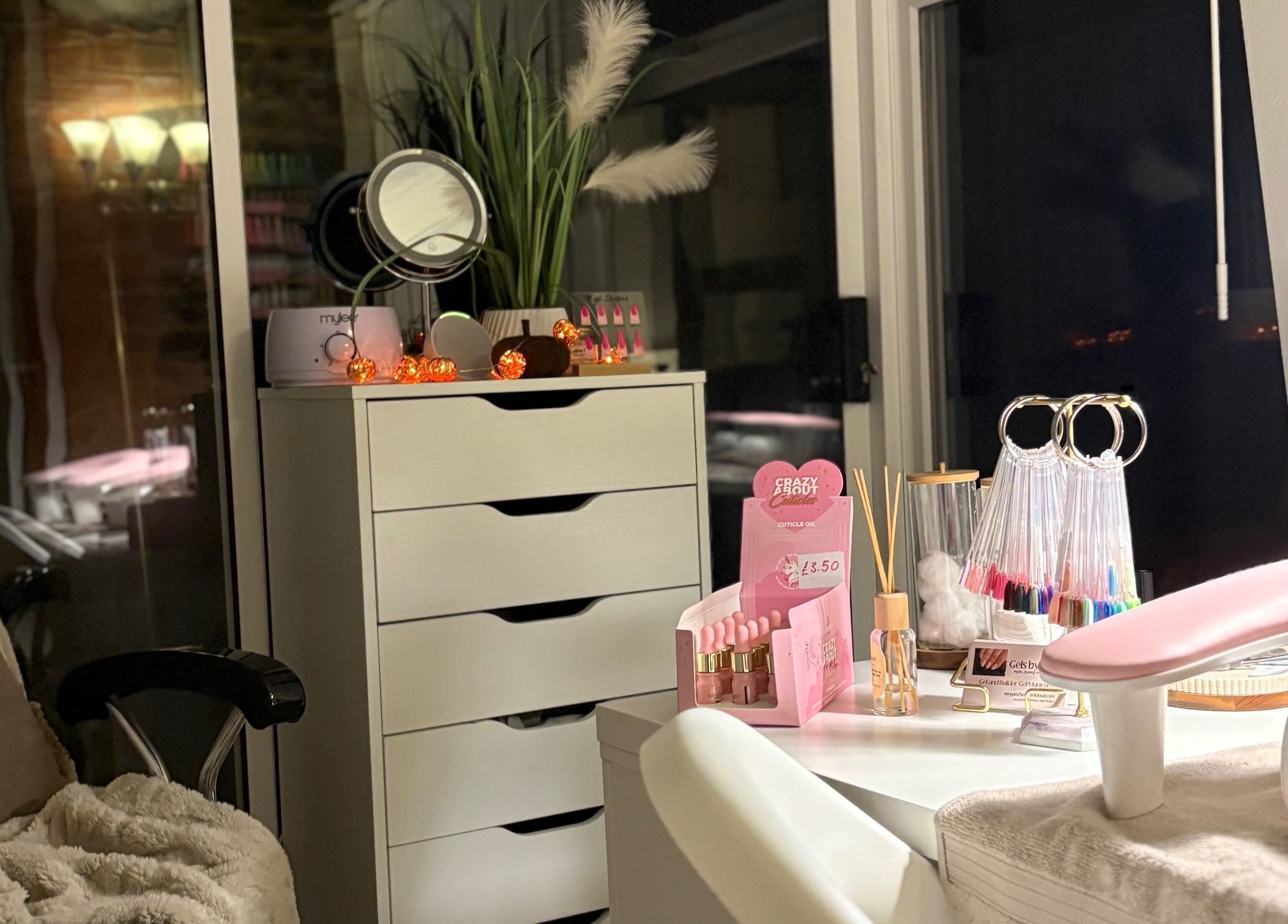 Cozy nail station at Gels by Meg in Welshpool, Wales, GB featuring professional manicure setup and decor.