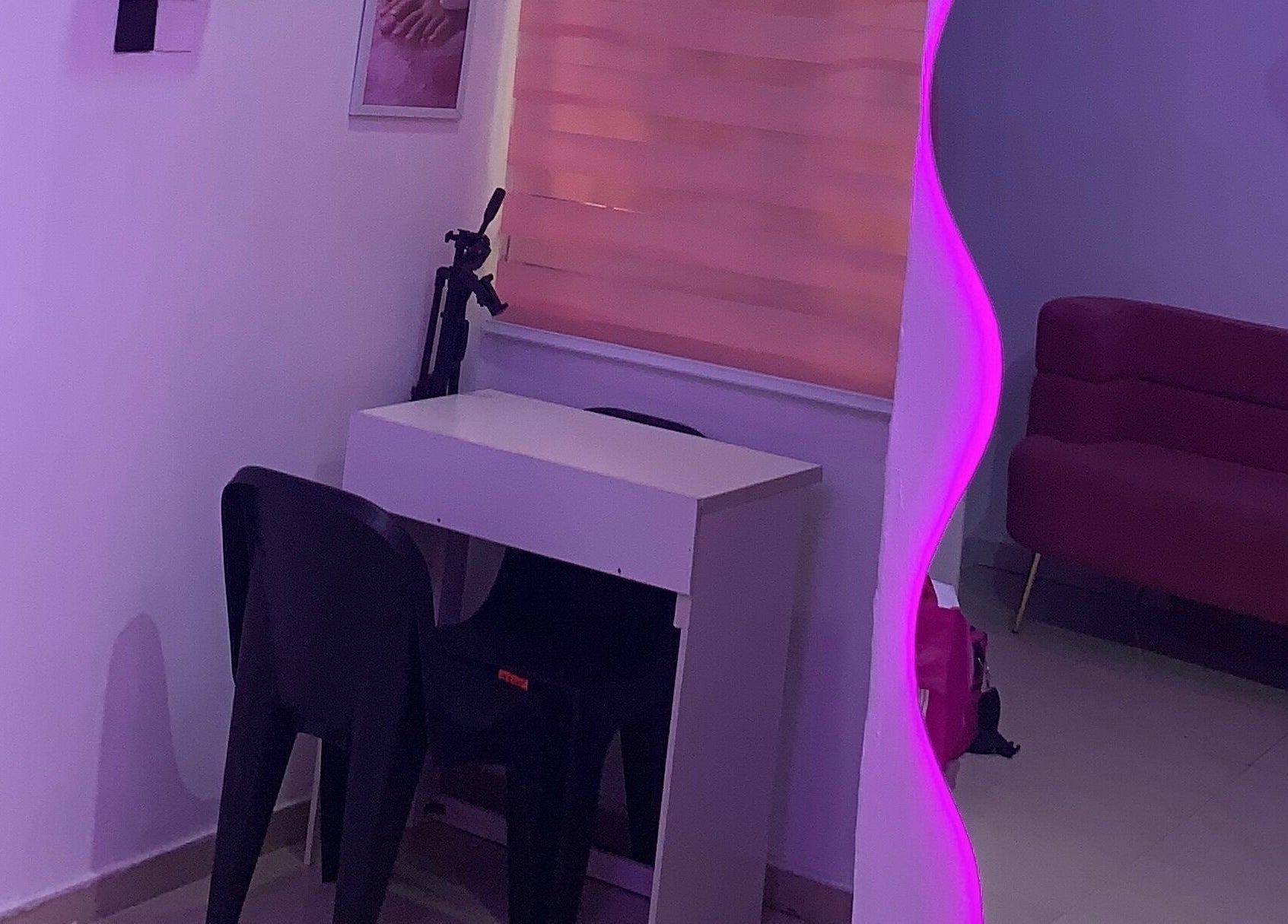 Cozy nail salon area with mirror glow at Nailed by Mokz, Lekki, Lagos, NG.