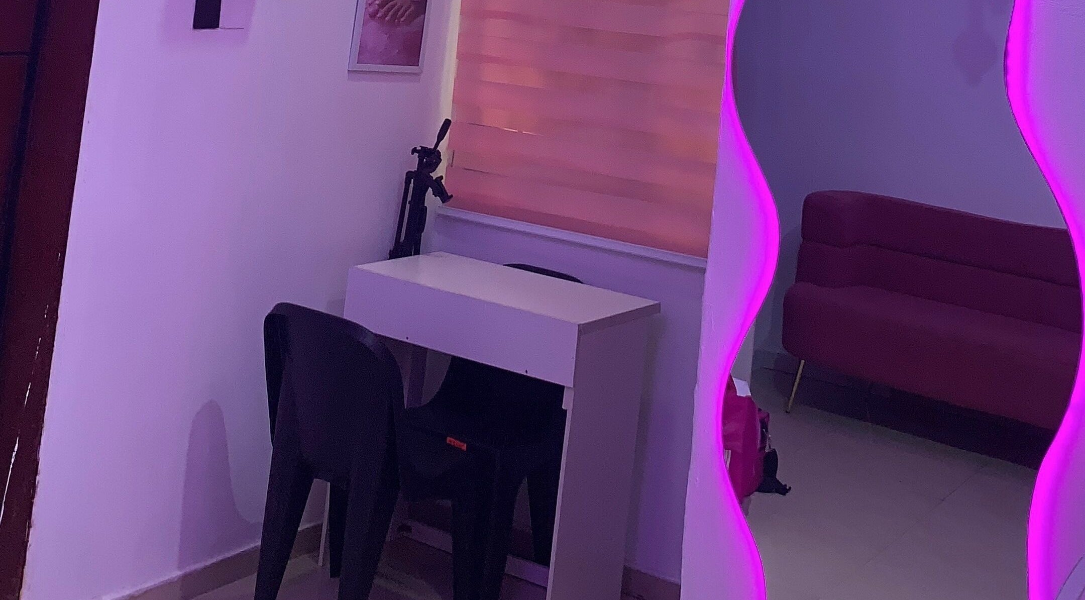 Cozy nail salon area with mirror glow at Nailed by Mokz, Lekki, Lagos, NG.