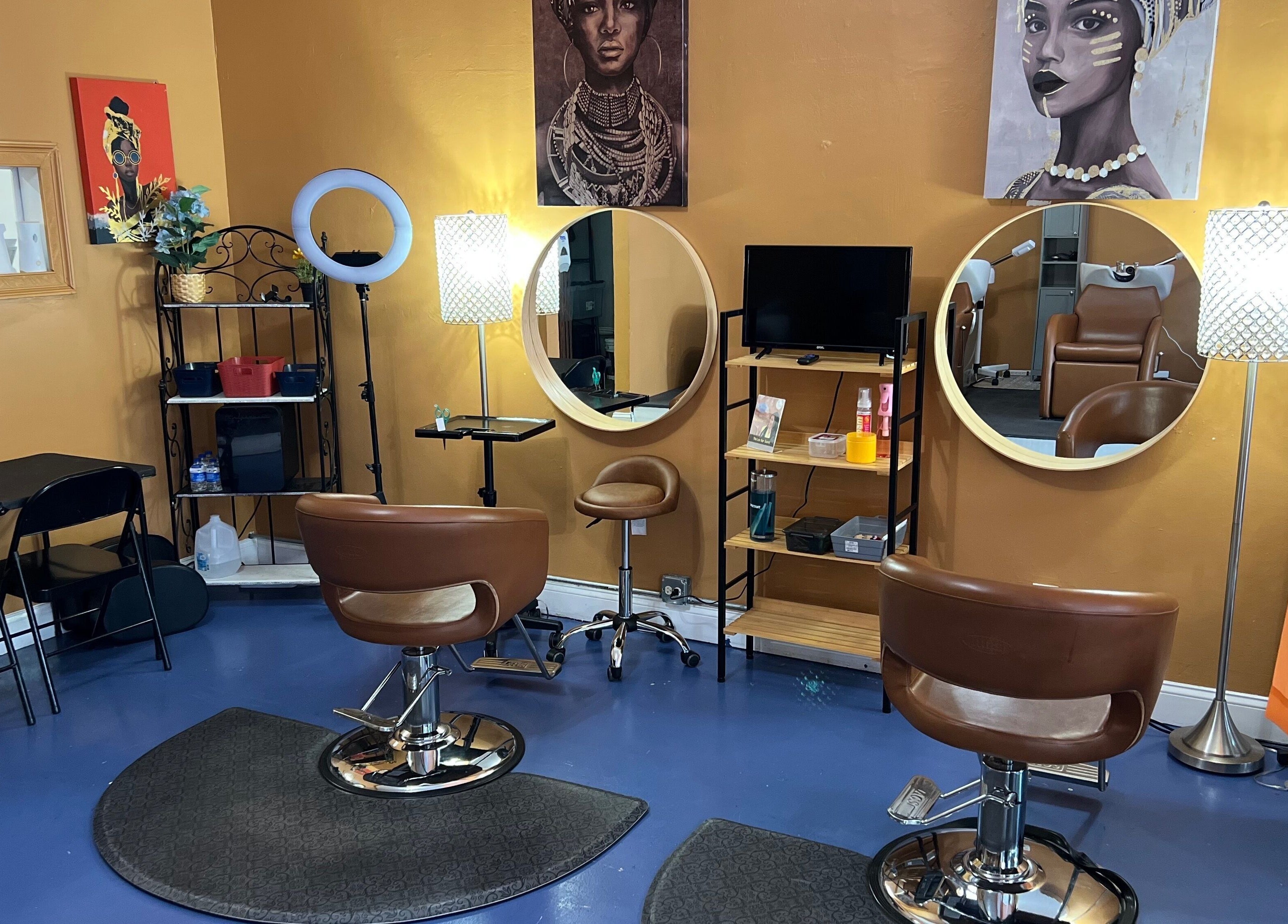 Stylish interior of Orlando Lox Bar in Orlando, Florida, US, featuring elegant salon chairs and artistic decor.