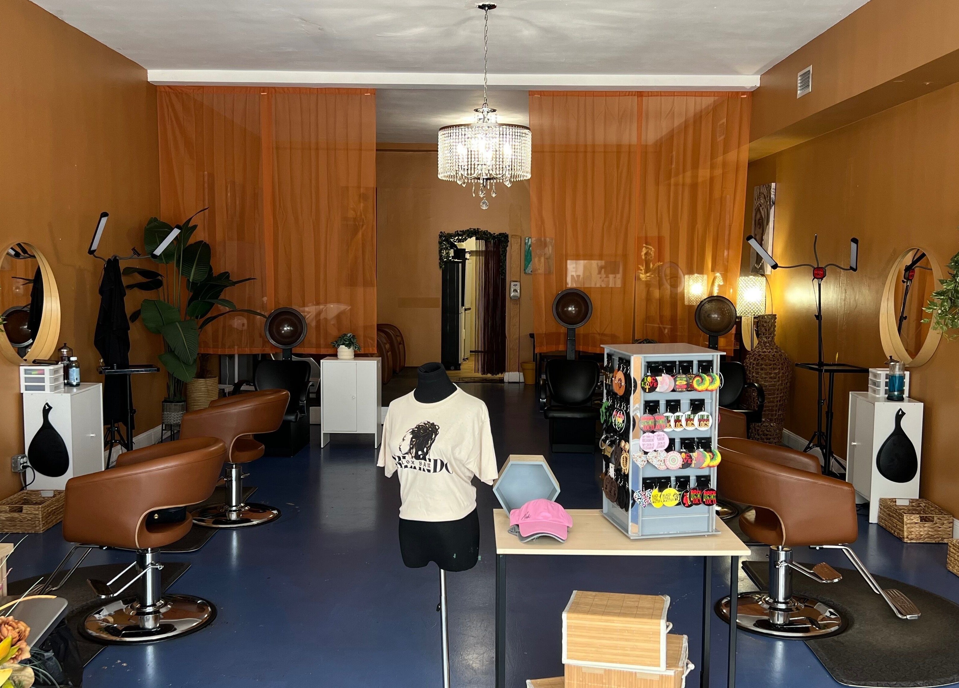 Inviting interior of Orlando Lox Bar, a beauty salon in Orlando, Florida, US, featuring stylish decor and seating.