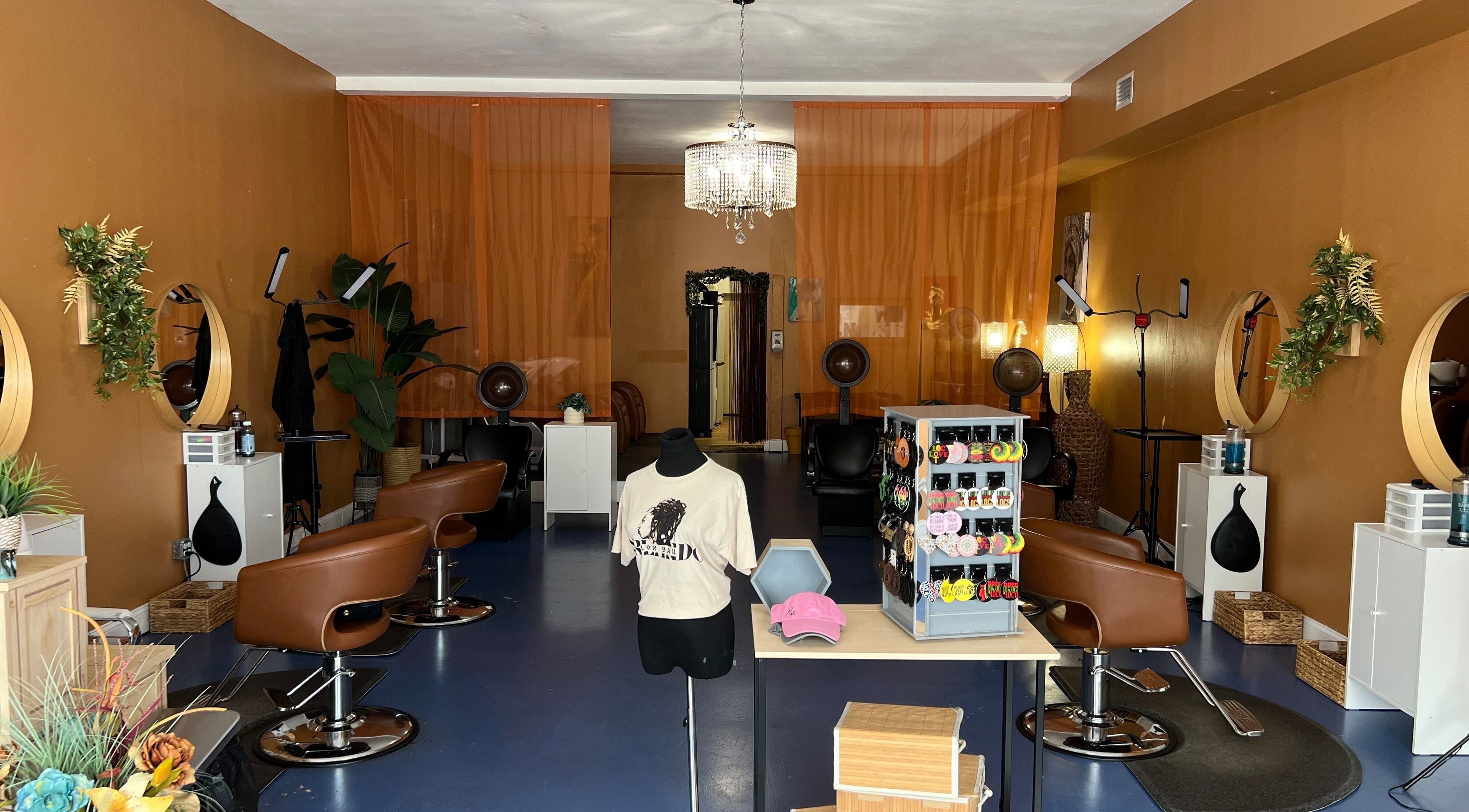 Inviting interior of Orlando Lox Bar, a beauty salon in Orlando, Florida, US, featuring stylish decor and seating.