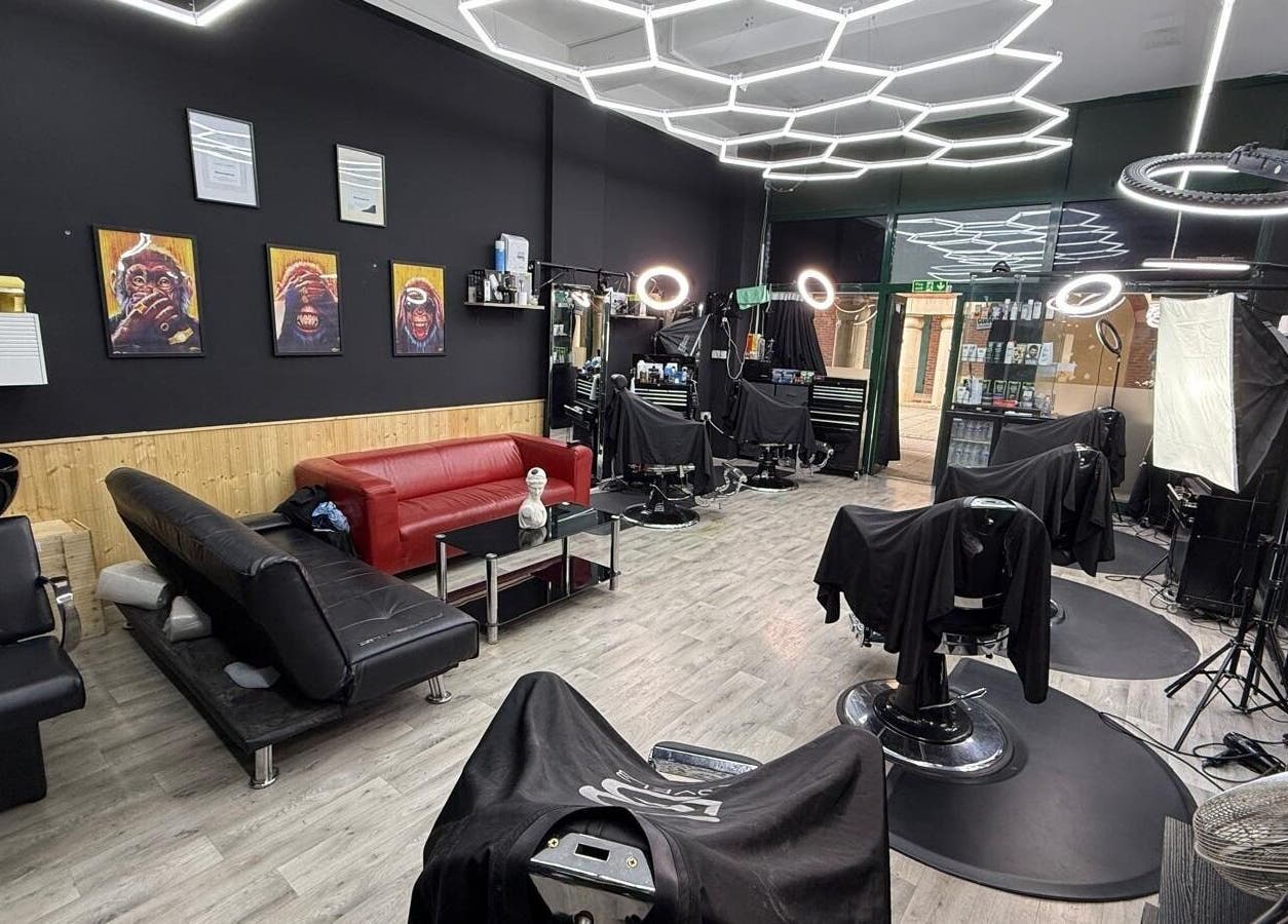 Interior of Cs Studio Vip Barbers in London, England, GB featuring stylish decor and modern barber chairs.