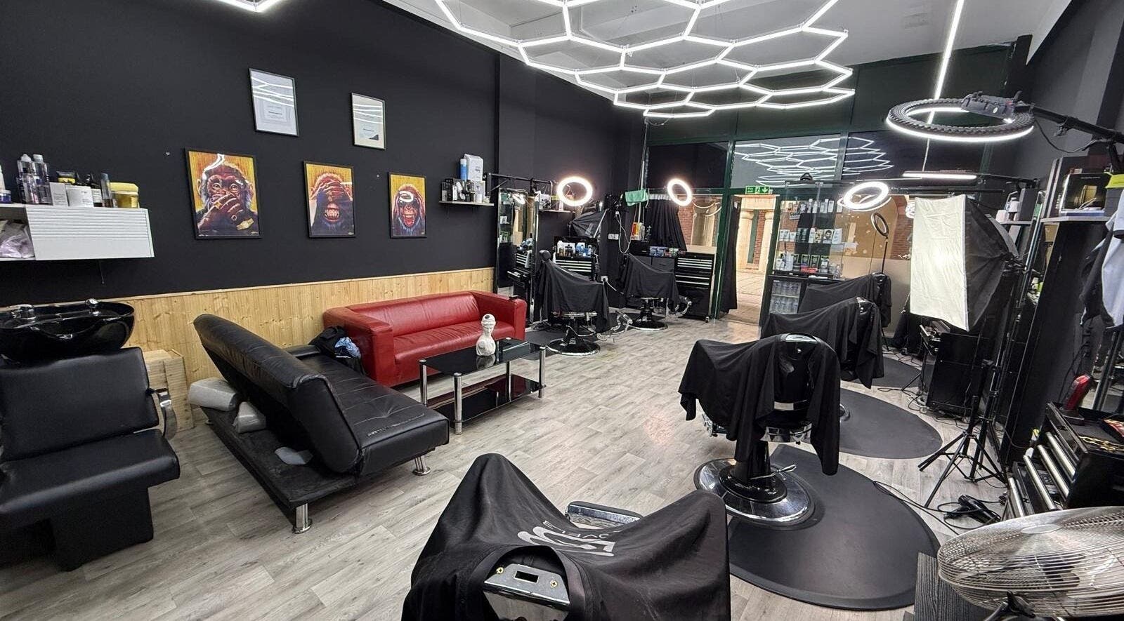 Interior of Cs Studio Vip Barbers in London, England, GB featuring stylish decor and modern barber chairs.