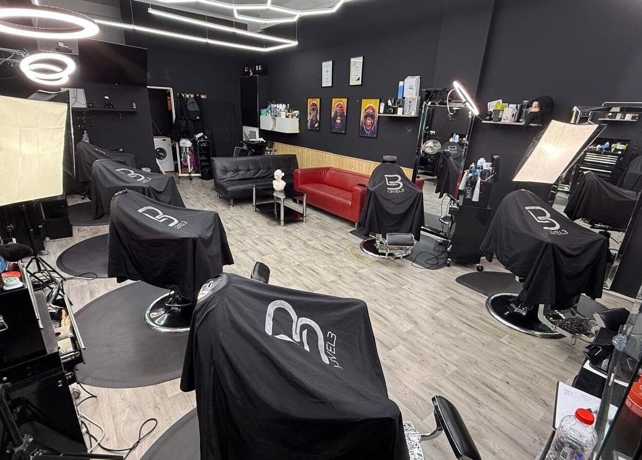 Modern interior of Cs Studio Vip Barbers in London, England, GB showcasing stylish chairs and decor.