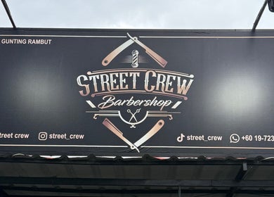 Street Crew Barbershop signboard in Kuala Lumpur, Wilayah Persekutuan Kuala Lumpur, MY, showcasing contact details.