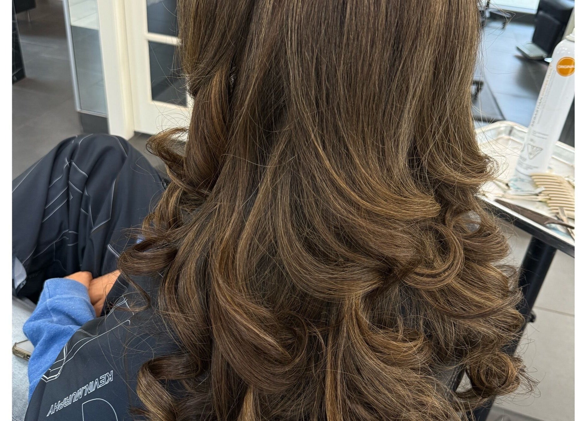 Elegant curls styled at Sheena McCart in Vancouver, British Columbia, CA, showcasing expert hairstyling.