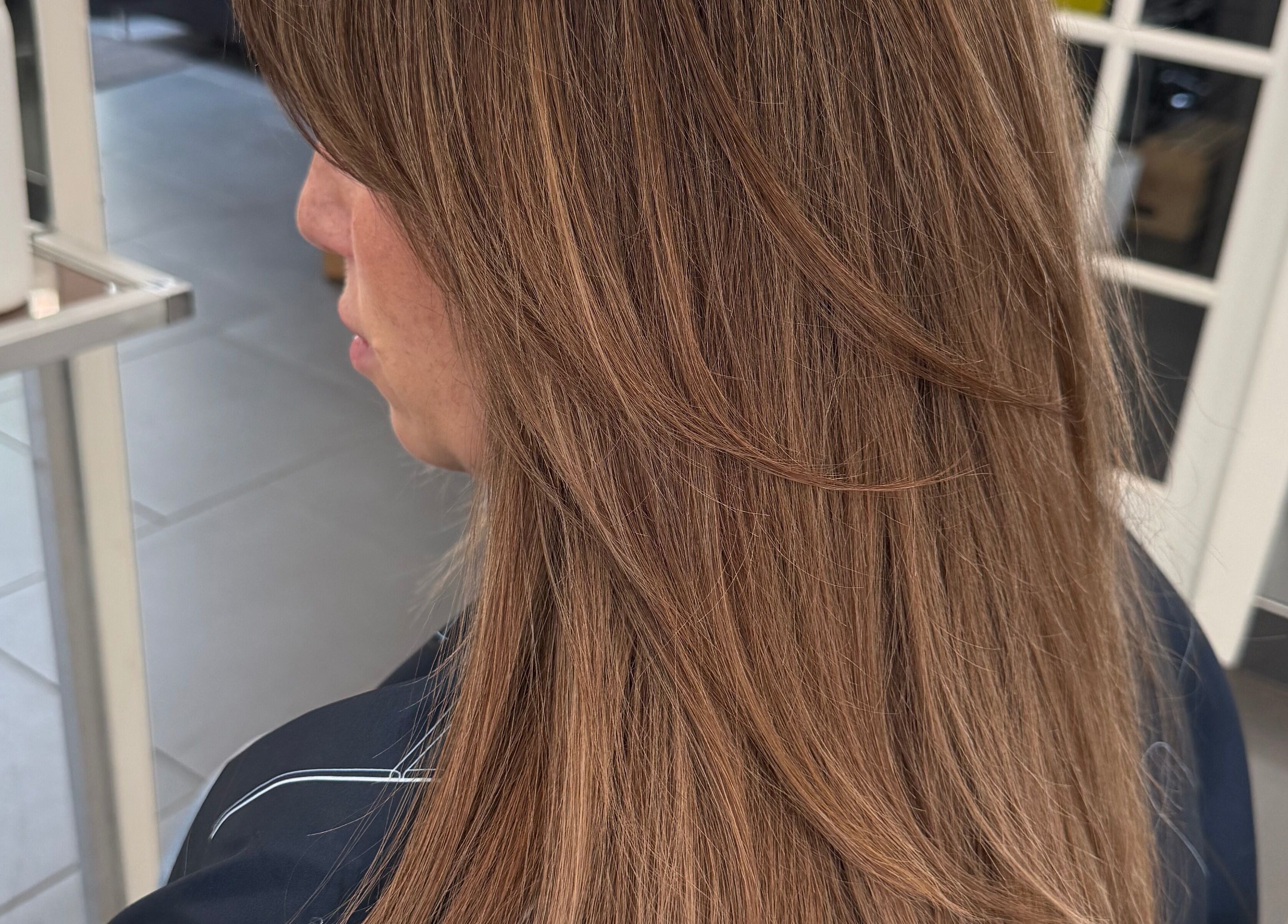 Elegant long hair styling at Sheena McCart, Vancouver, British Columbia, CA.