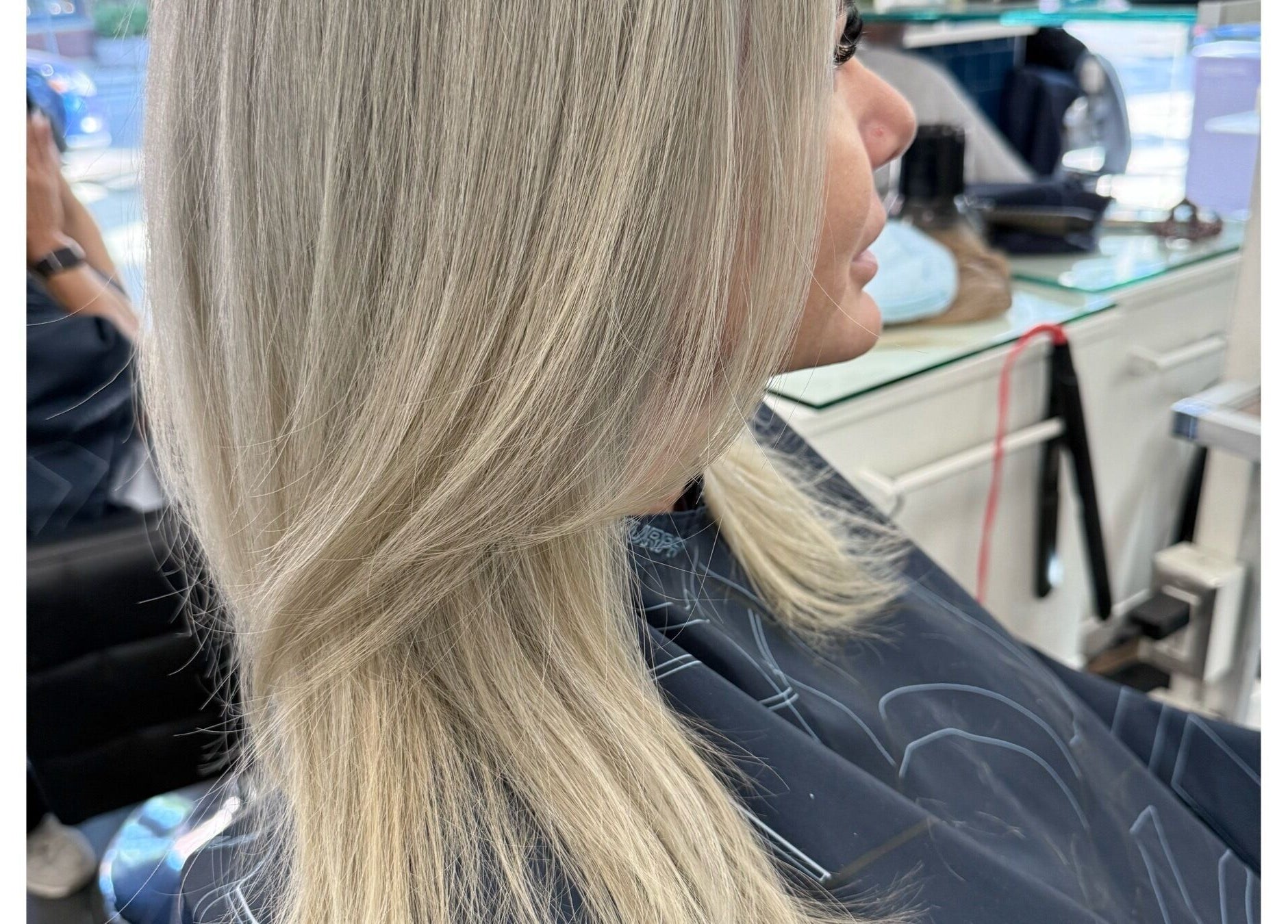 Elegant silver blonde hair styled at Sheena McCart in Vancouver, British Columbia, CA.