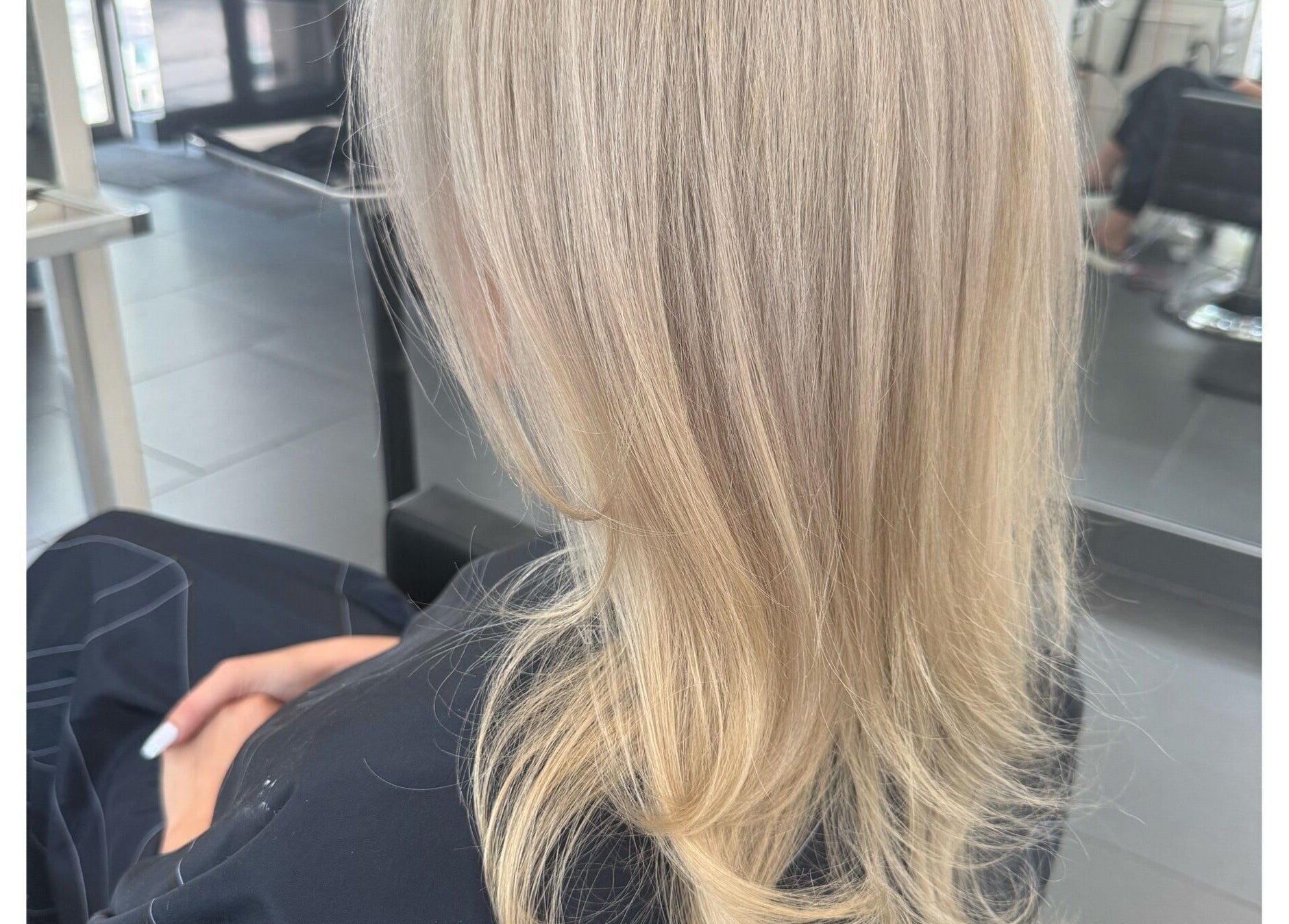 Elegant blonde hairstyle at Sheena McCart, Vancouver, British Columbia, CA.