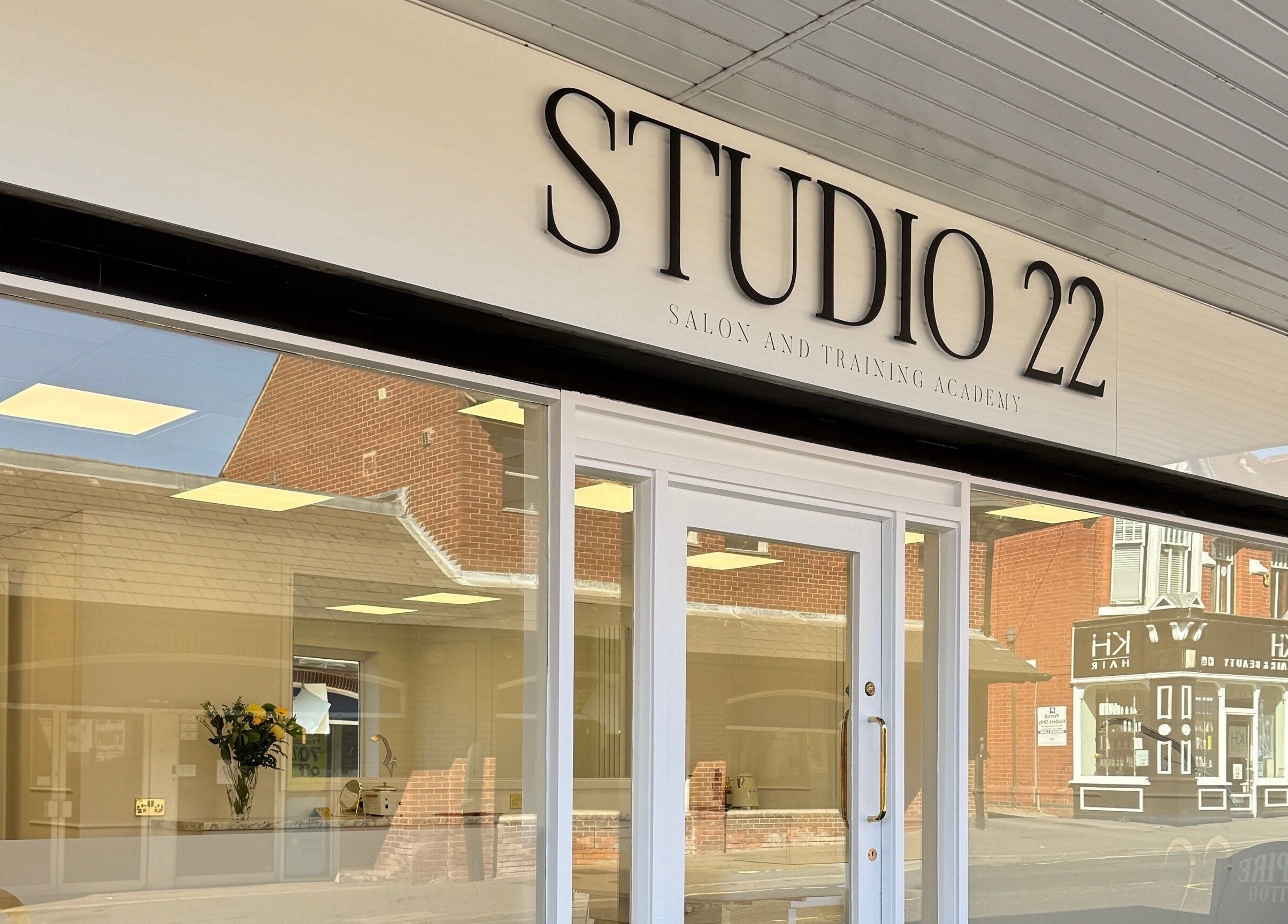 Front entrance of Studio 22 salon and training academy in Ripley, England, GB.