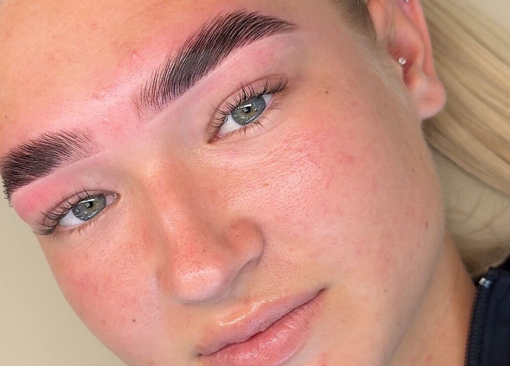Close-up of perfectly shaped eyebrows at Studio 22 in Ripley, England, GB, showcasing expert grooming.