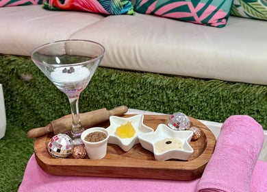 Luxurious spa setup at That Girl Beauty Bar, Miami, Florida, US, featuring skincare treatments and decor.