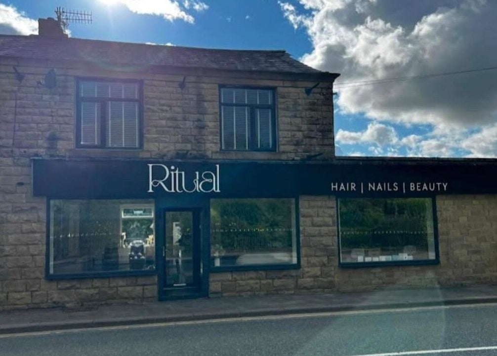 The Retreat at Ritual Ramsbottom in Ramsbottom, England, showcases its stone facade under a bright sky.