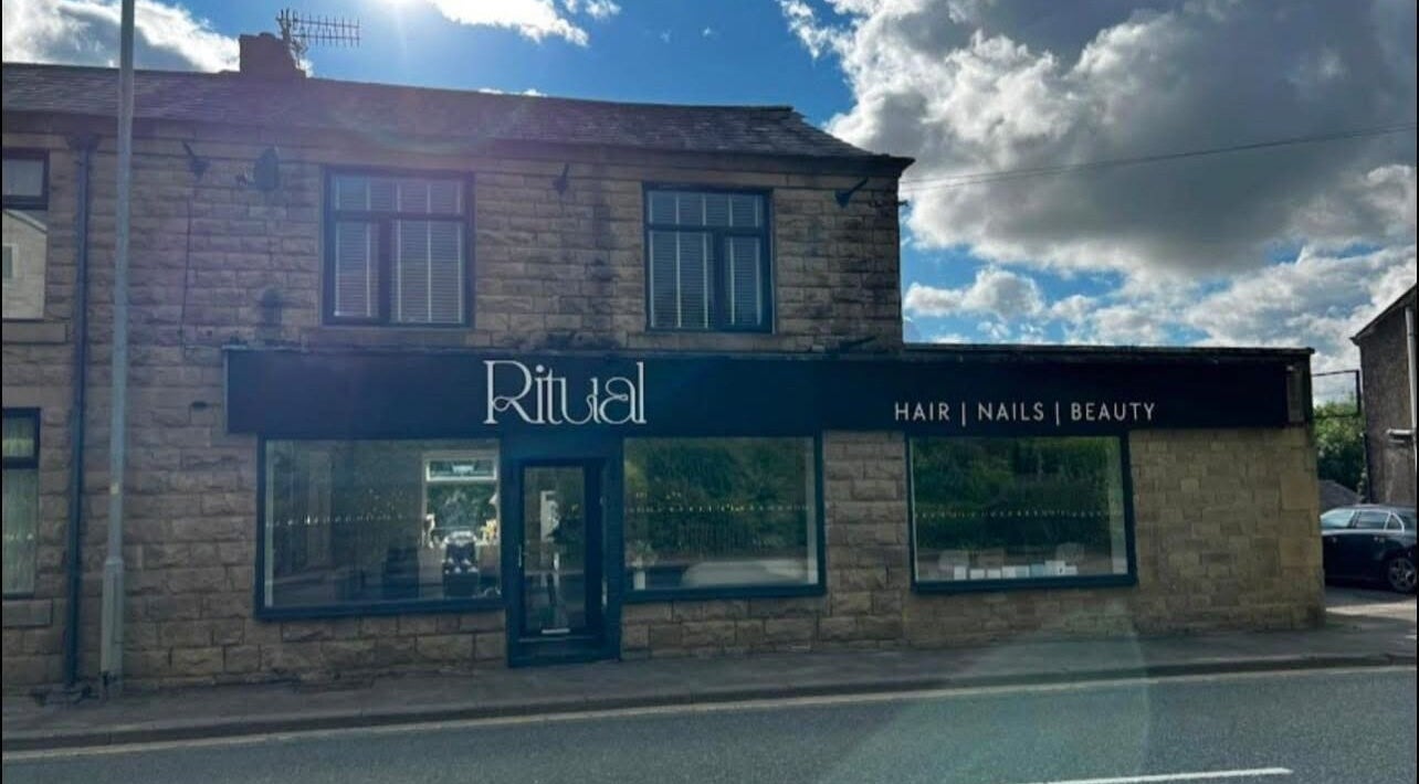 The Retreat at Ritual Ramsbottom in Ramsbottom, England, showcases its stone facade under a bright sky.