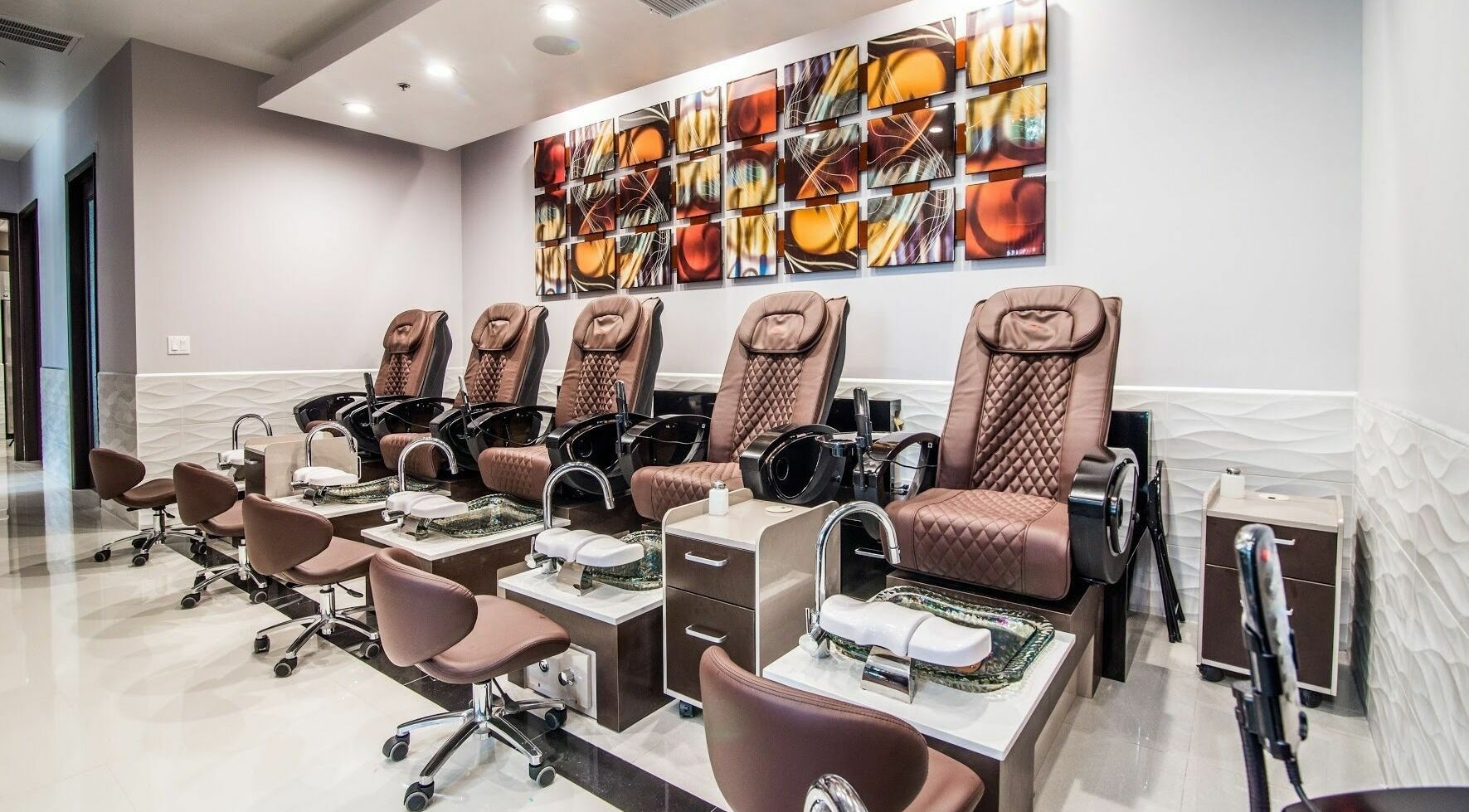 Relaxing pedicure chairs at Glow Spa and Nails in Houston, Texas, US, offering a tranquil spa experience.