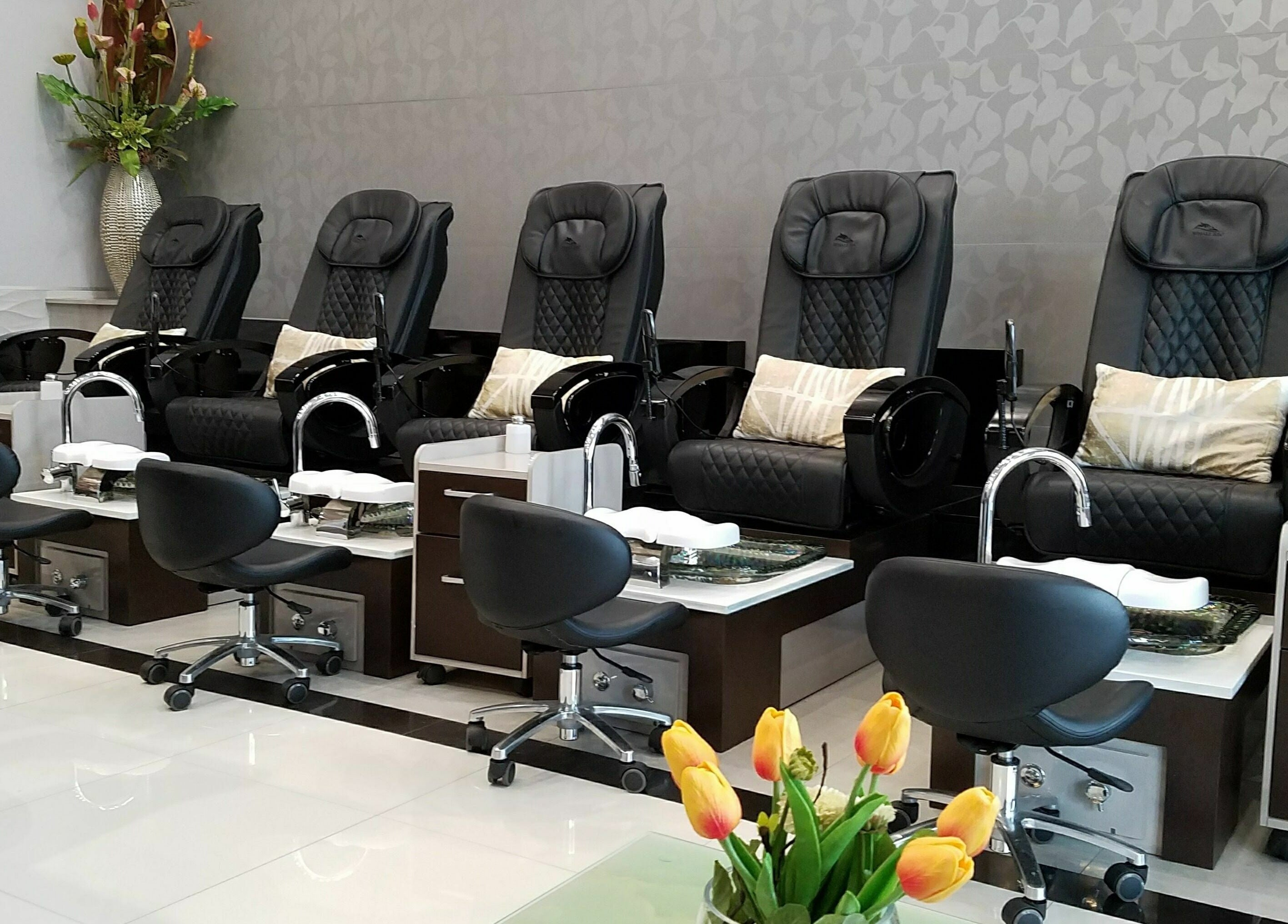 Elegant pedicure chairs at Glow Spa and Nails in Houston, Texas, US, providing a relaxing atmosphere.