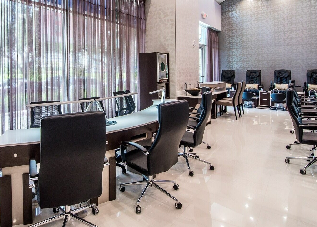 Modern interior of Glow Spa and Nails, a serene venue in Houston, Texas, US with stylish seating for relaxation.