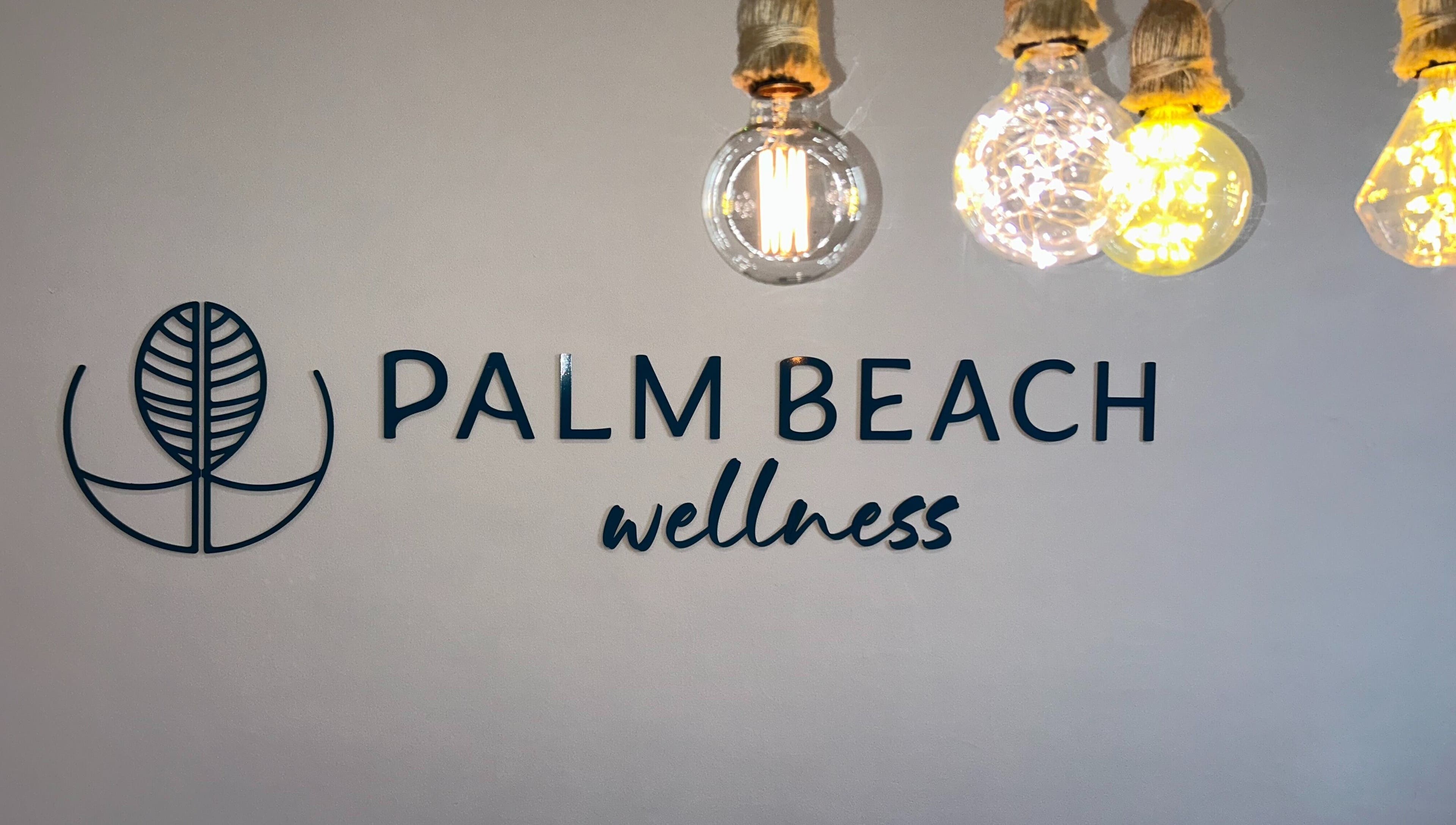 Palm Beach Wellness Nedlands logo with ambient lighting in Nedlands, Western Australia, AU.