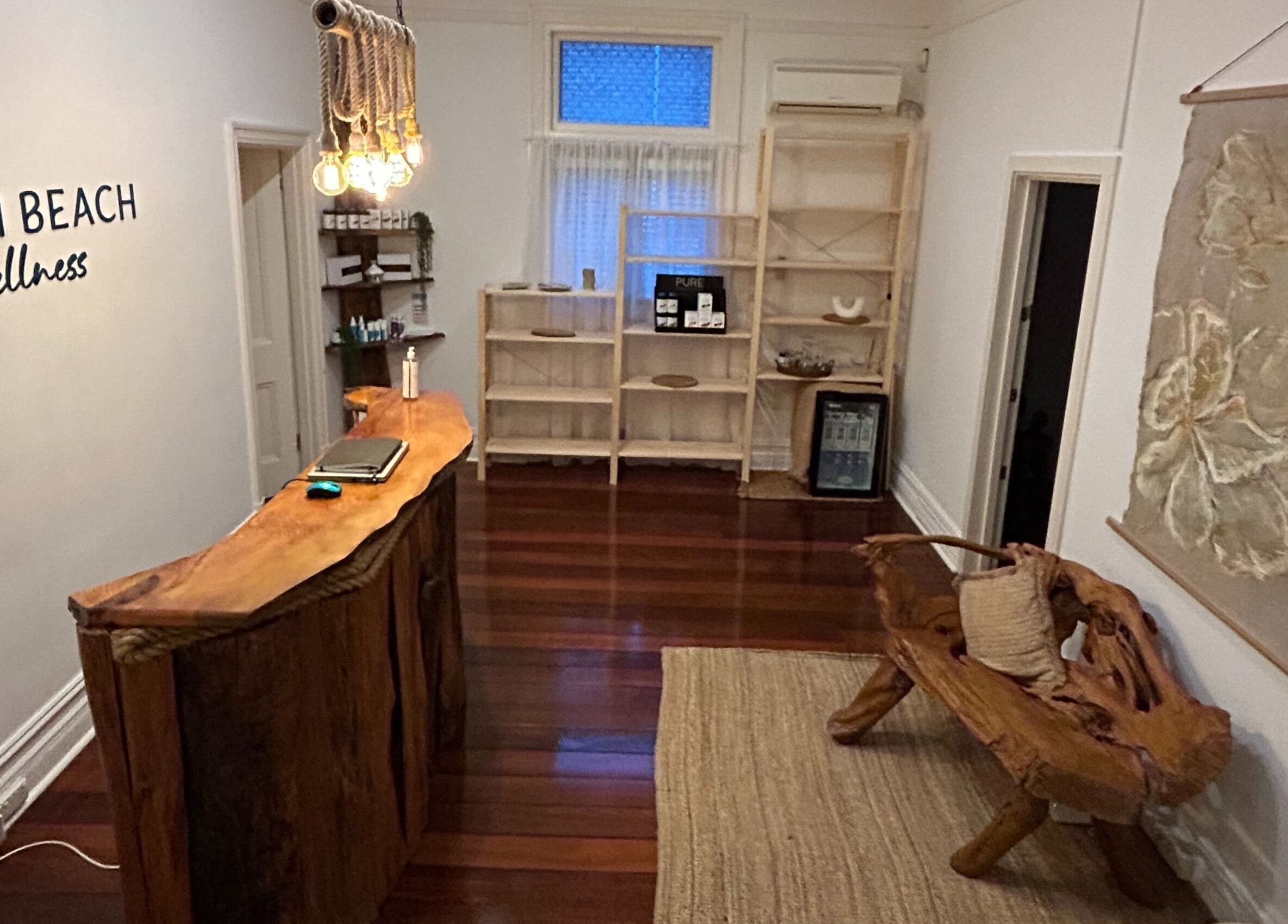 Rustic reception area at Palm Beach Wellness Nedlands in Nedlands, Western Australia, AU with wooden decor.