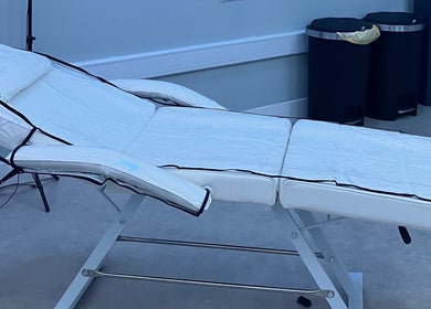 Spa chair at Beauty Enhance Limited, Cardiff, Wales, GB, ready for a relaxing treatment session.