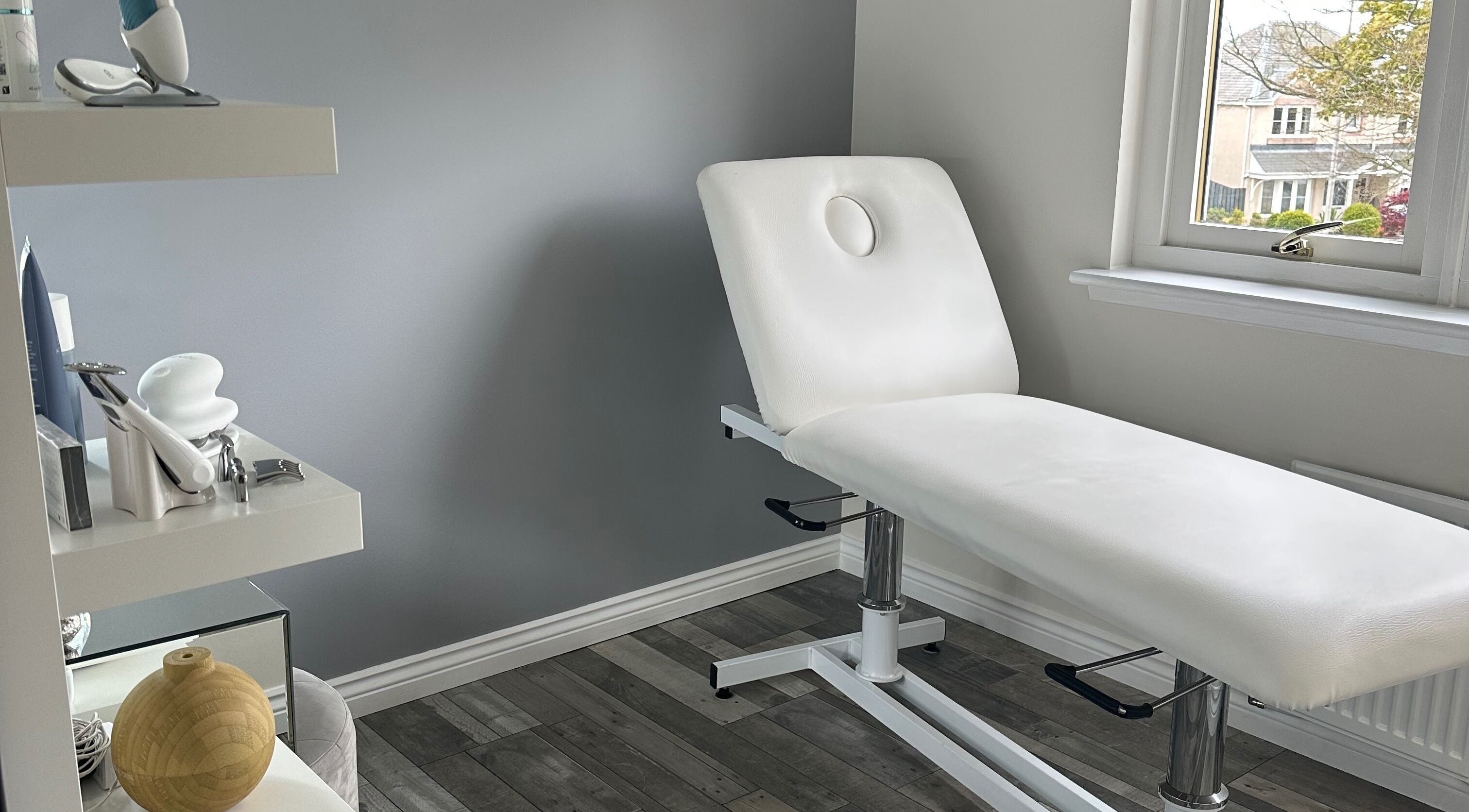 Comfortable treatment room at KC Skincare & Cosmetics, Kingseat, Scotland, GB with modern equipment.