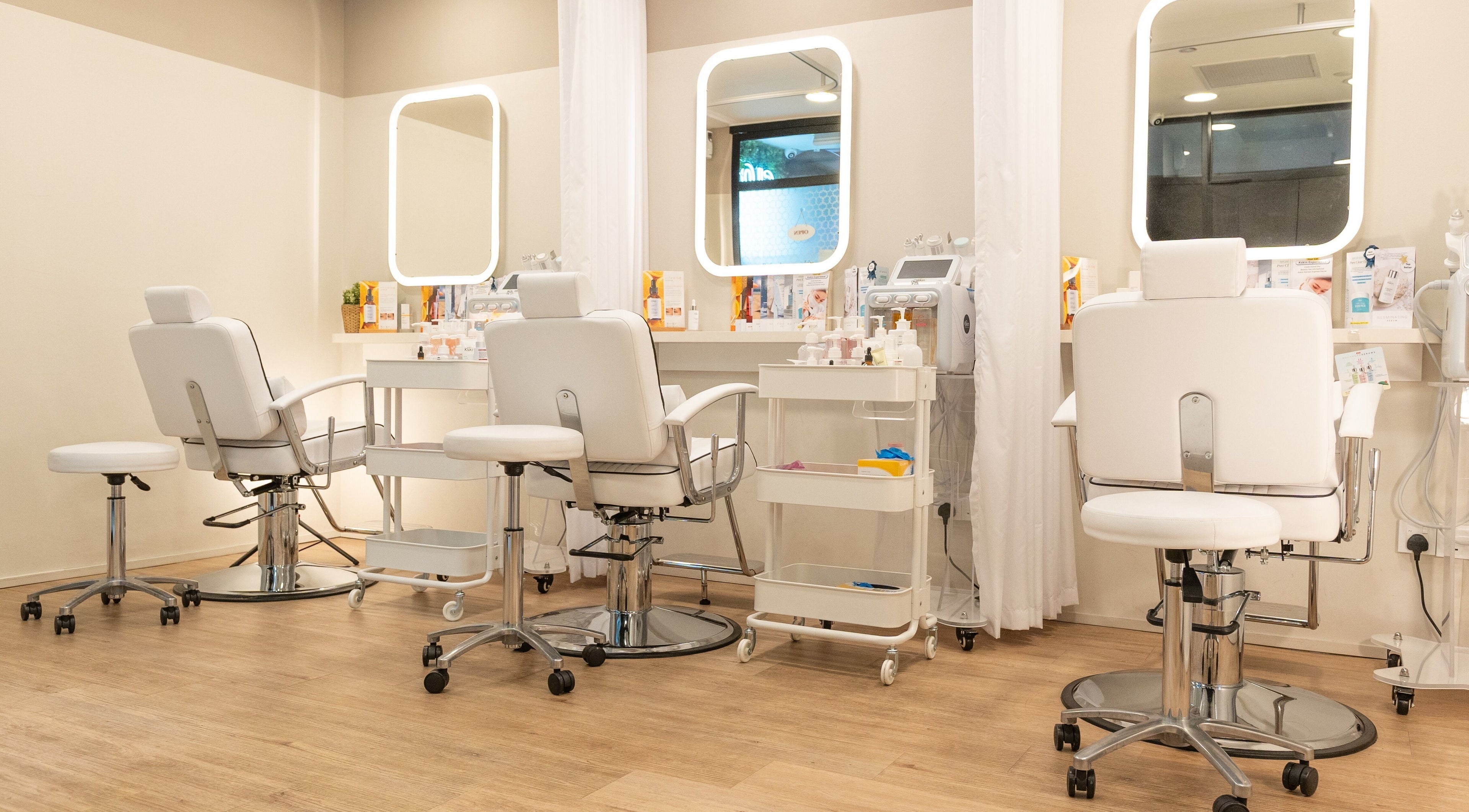Bright and modern facial chairs at Kskin Korean Express Facial - Chinatown Point, Singapore, SG.