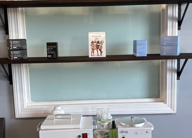 Product display at Splash of Lashes, Woonsocket, Rhode Island, US, showcasing beauty products and equipment.