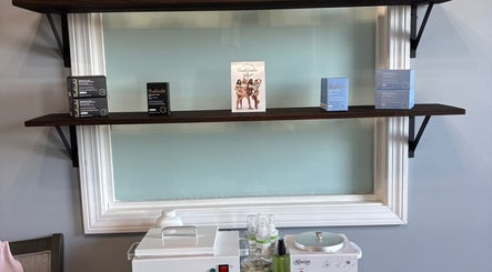 Product display at Splash of Lashes, Woonsocket, Rhode Island, US, showcasing beauty products and equipment.