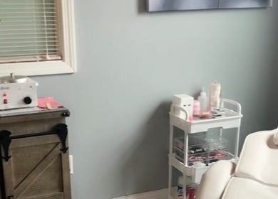 Tranquil treatment room at Splash of Lashes, Woonsocket, Rhode Island, US, showcasing spa essentials.