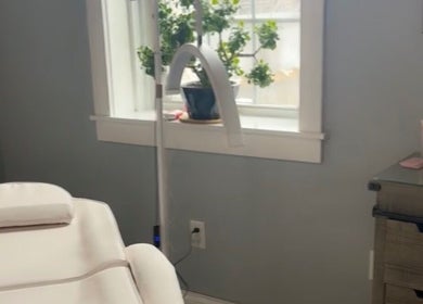 Cozy lash treatment room at Splash of Lashes in Woonsocket, Rhode Island, US featuring soothing decor.