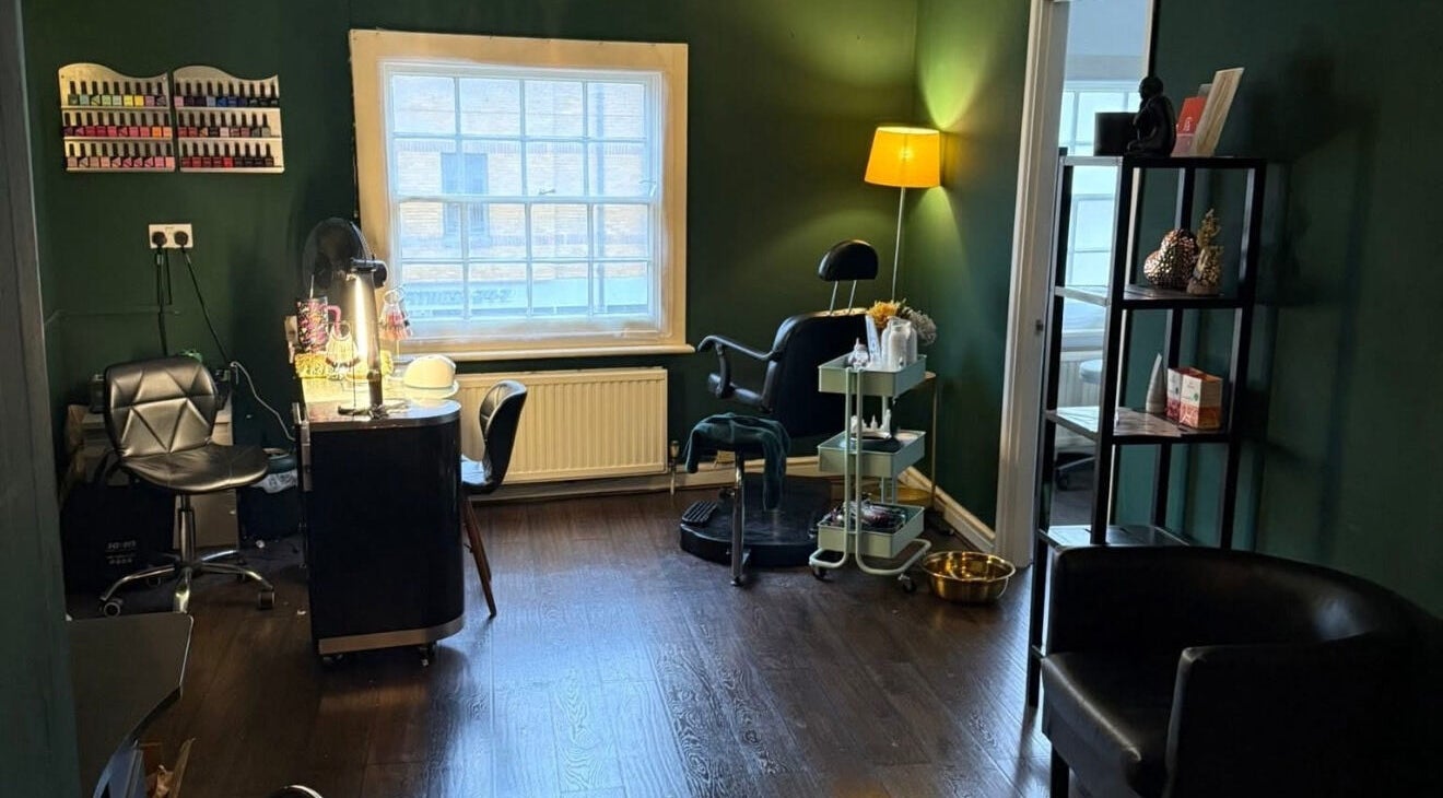 Cozy interior of MLW Beauty in Maidstone, England, GB, with chic decor and modern styling chairs.