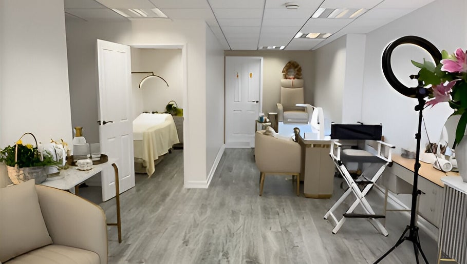 Relaxing interior of Glow Beauty Studio in Guernsey, Saint Peter Port, featuring modern furnishings and ambient lighting.