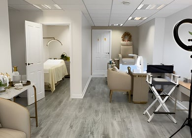 Relaxing interior of Glow Beauty Studio in Guernsey, Saint Peter Port, featuring modern furnishings and ambient lighting.