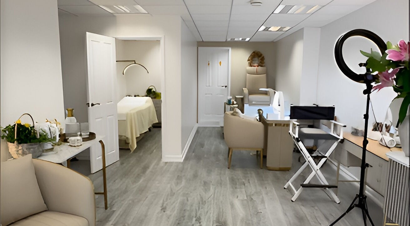 Relaxing interior of Glow Beauty Studio in Guernsey, Saint Peter Port, featuring modern furnishings and ambient lighting.