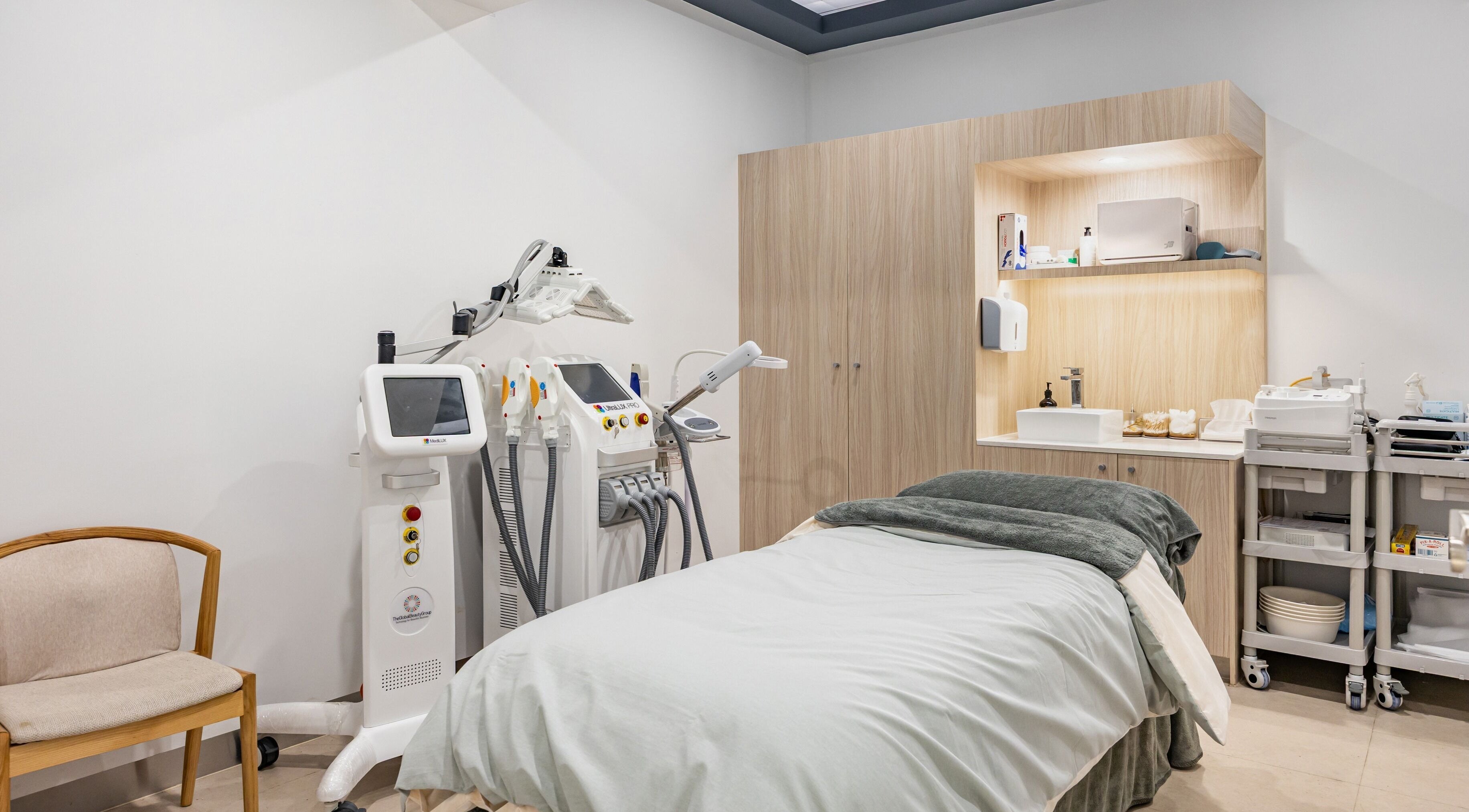Modern treatment room at Innova Skin Studio Camberwell in Melbourne, Victoria, AU featuring advanced skincare equipment.