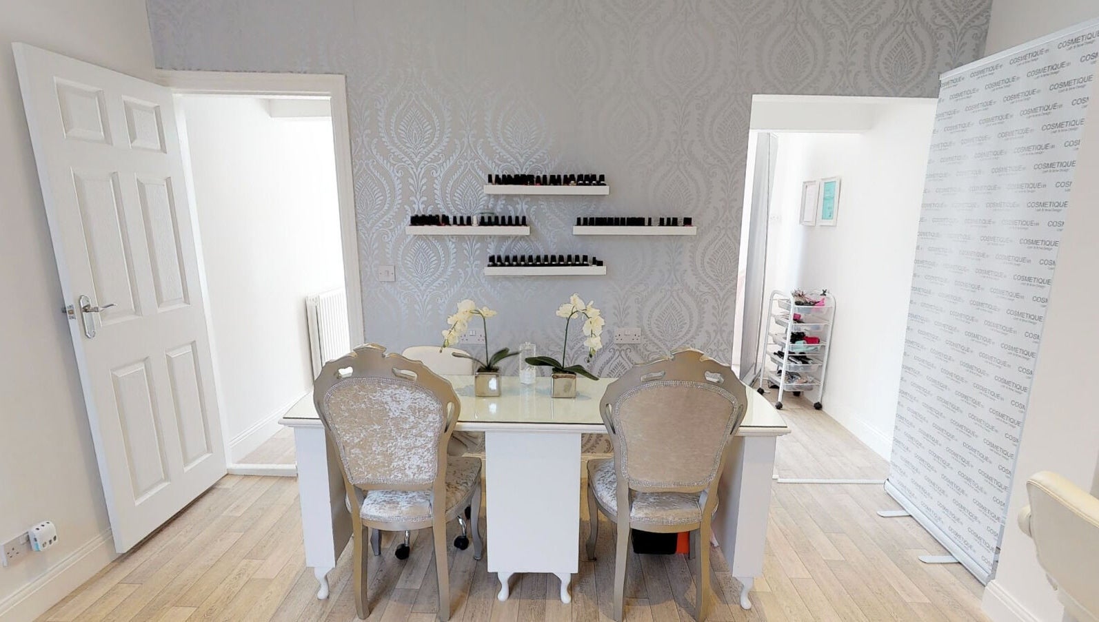 Chic makeup desk at Makeup By Ruby, Chesterfield, England. Elegantly designed with floral decor and nail polishes.