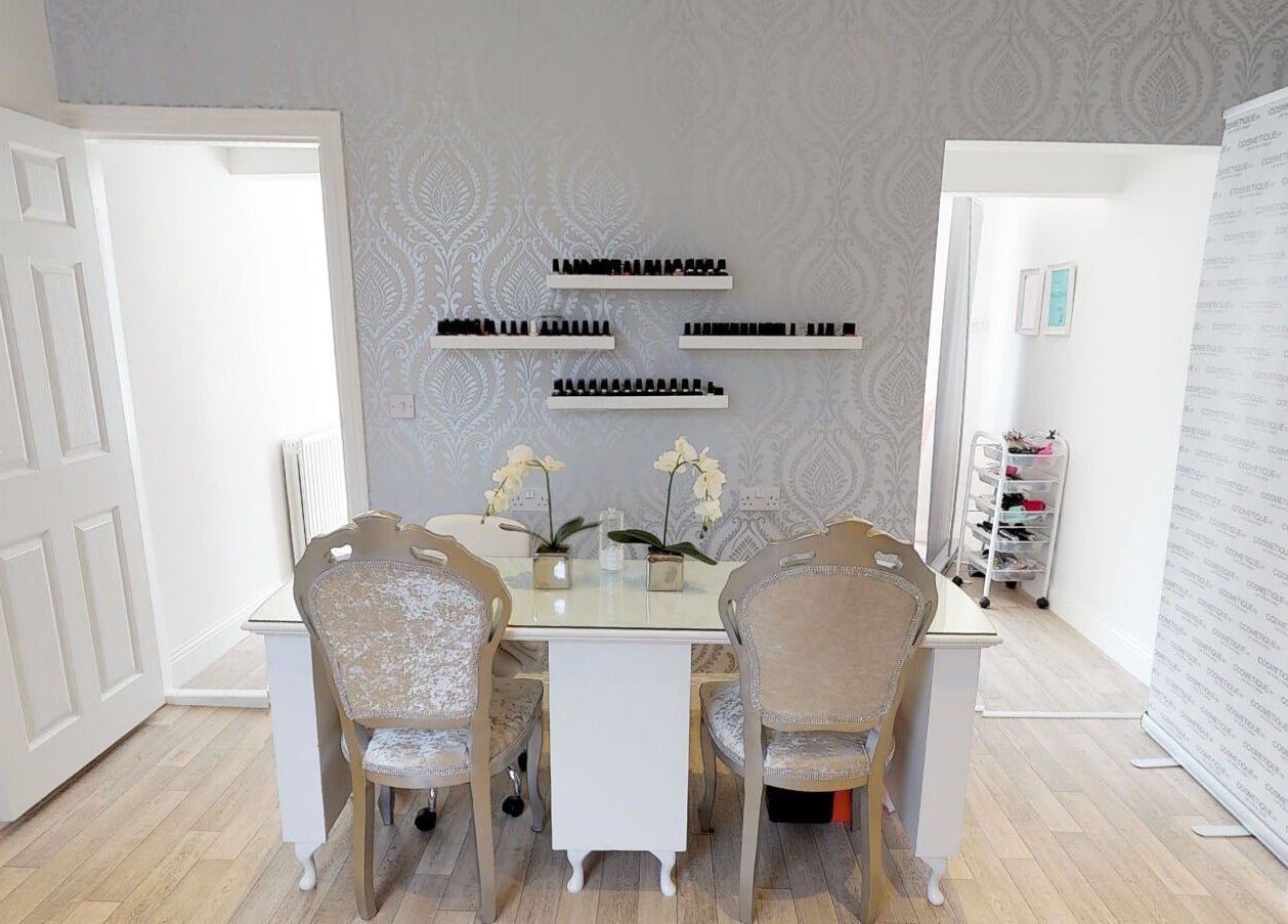 Chic makeup desk at Makeup By Ruby, Chesterfield, England. Elegantly designed with floral decor and nail polishes.