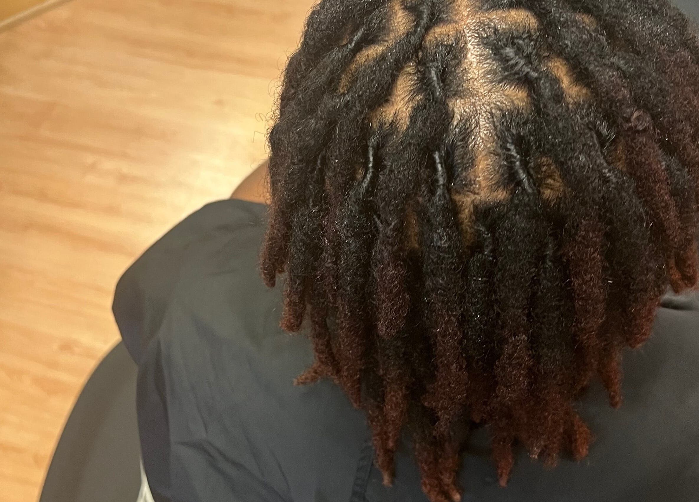 Intricate dreadlocks styled at Tasja’s Style Studio, Madison, Wisconsin, US.