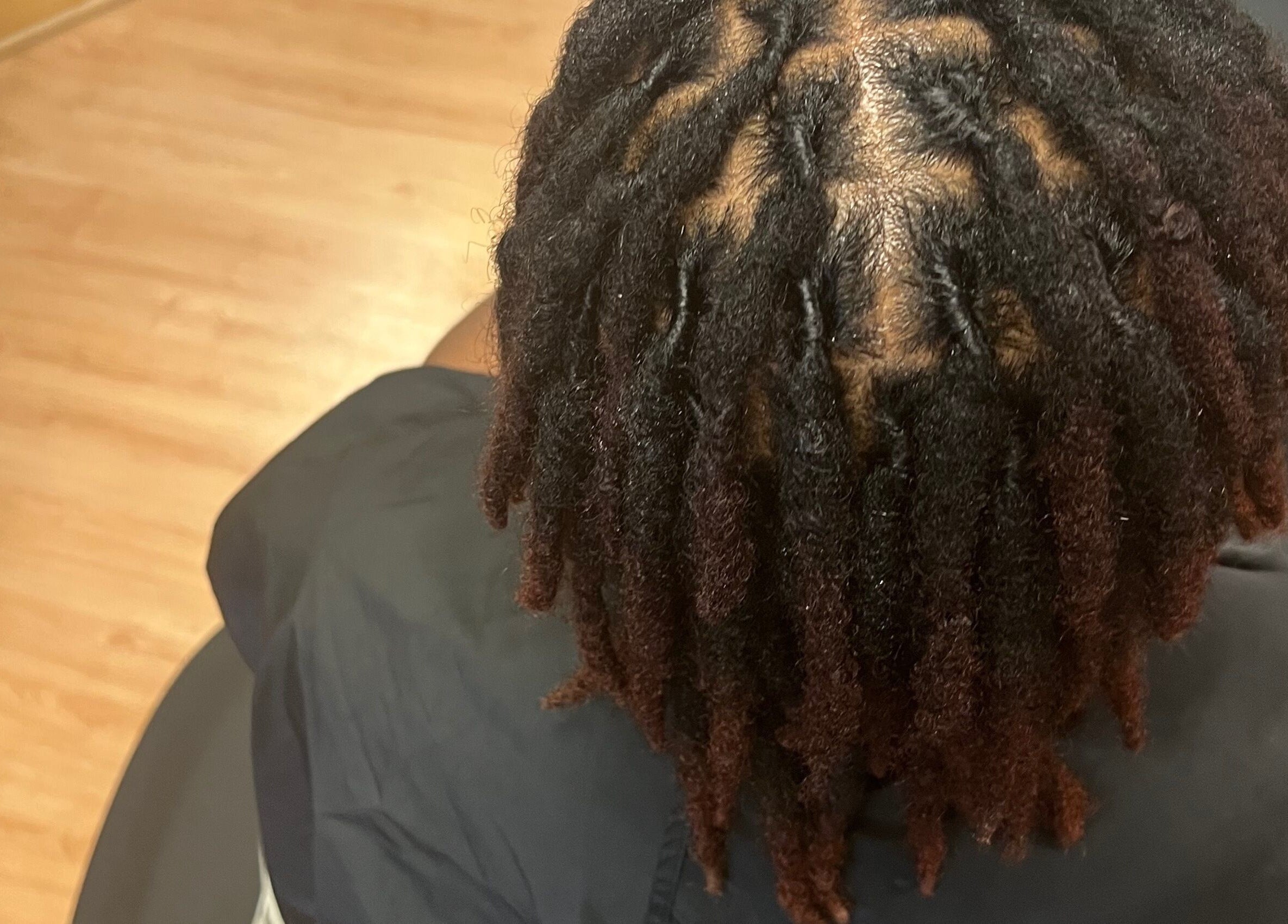 Intricate dreadlocks styled at Tasja’s Style Studio, Madison, Wisconsin, US.