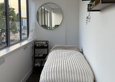 Calm therapy room at Beauty by Gonzàlez, West Bridgford, England, GB showcasing a cozy treatment bed.