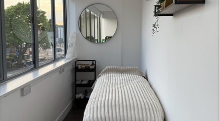 Calm therapy room at Beauty by Gonzàlez, West Bridgford, England, GB showcasing a cozy treatment bed.